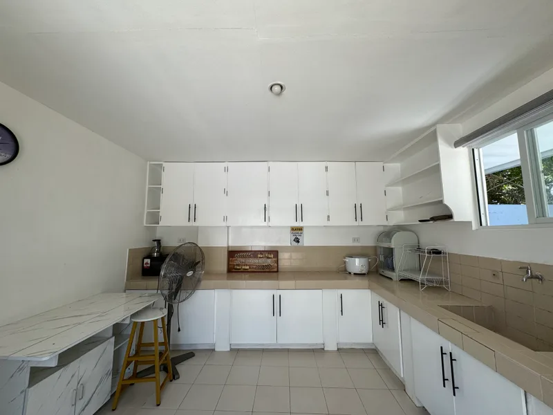 Kitchen counters, sink, storage, and small appliances. Bring groceries or coordinate an outside caterer.